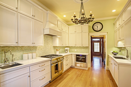 Cambria Torquay with Benjamin Moore Butter Pecan Cabinets, Watercolor Crackle Glazed Mini Subway Tiles and Natural Finish Oak Flooring